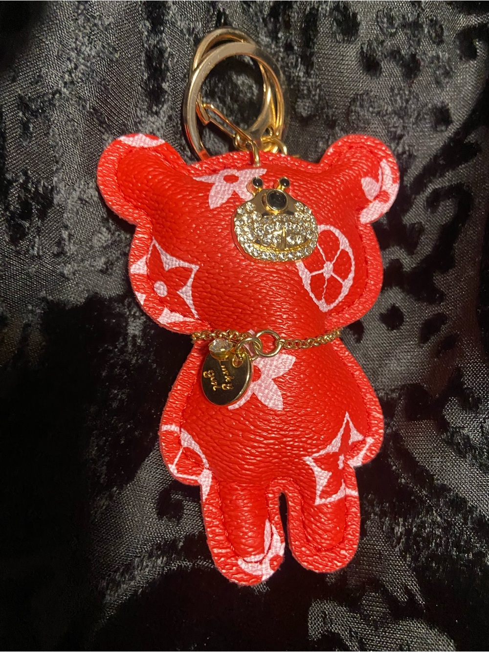 Red Bear Keychain Charm with White Motif and Gold Accents